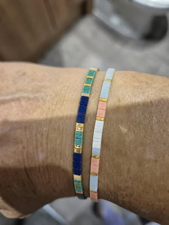 Customer photo: two Miyuki glass tile bracelets worn together on a wrist